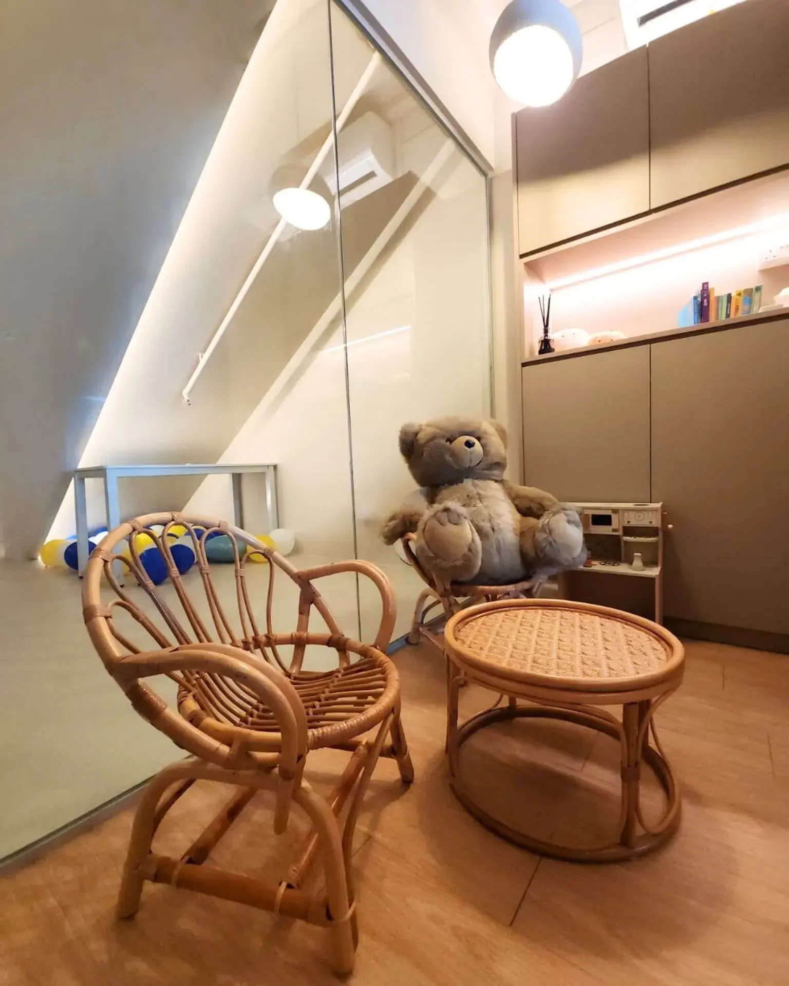 The playroom with balloons left along the mirrored wall